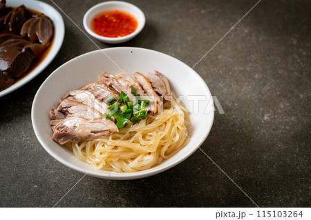 dried duck noodles in white bowl 115103264