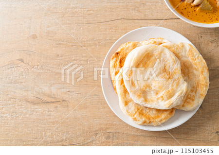 Chicken curry soup with roti 115103455