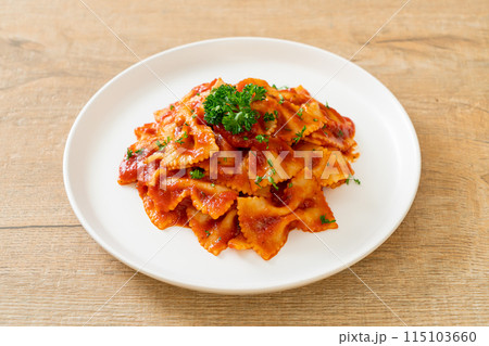 farfalle pasta in tomato sauce with parsley farfalle pasta in tomato sauce with parsley 115103660