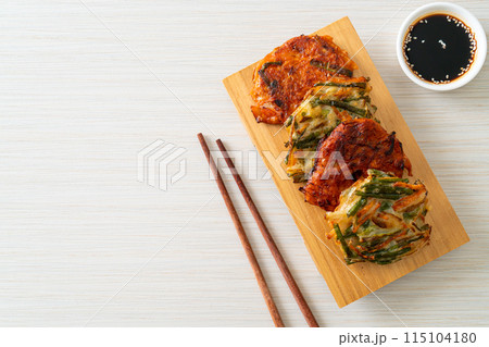 Pajeon or Korean pancake and Korean Kimchi pancake or Kimchijeon on white background Pajeon or Korean pancake and Korean Kimchi pancake or Kimchijeon on white background 115104180
