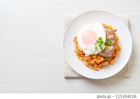 Kimchi fried rice with fried egg and pork Kimchi fried rice with fried egg and pork 115104226