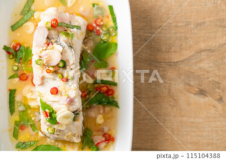 steamed sea bass fish with herbs steamed sea bass fish with herbs 115104388