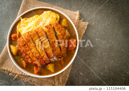 curry rice with fried pork cutlet and creamy omelet curry rice with fried pork cutlet and creamy omelet 115104406