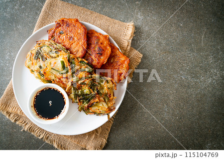 Pajeon or Korean pancake and Korean Kimchi pancake or Kimchijeon on white background Pajeon or Korean pancake and Korean Kimchi pancake or Kimchijeon on white background 115104769