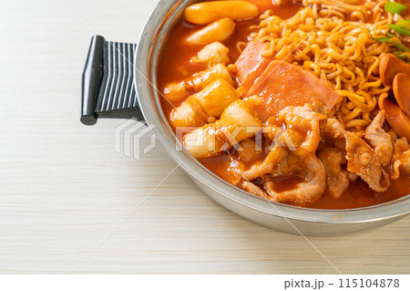 Budae Jjigae or Budaejjigae (Army stew or Army base stew). It is loaded with Kimchi, spam, sausages, ramen noodles and much more Budae Jjigae or Budaejjigae (Army stew or Army base stew). It is loaded with Kimchi, spam, sausages, ramen noodles and much more 115104878