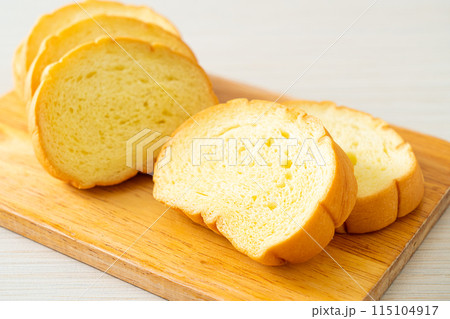 potatoes bread sliced on wood board potatoes bread sliced on wood board 115104917