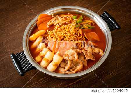 Budae Jjigae or Budaejjigae (Army stew or Army base stew). It is loaded with Kimchi, spam, sausages, ramen noodles and much more Budae Jjigae or Budaejjigae (Army stew or Army base stew). It is loaded with Kimchi, spam, sausages, ramen noodles and much more 115104945