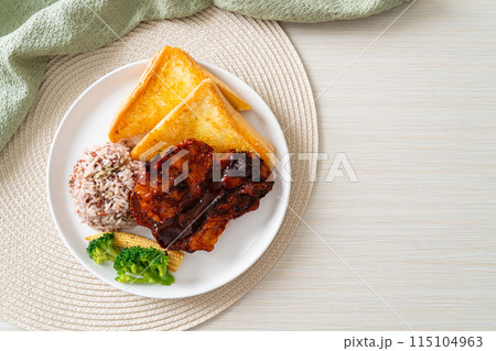 barbecue pork steak with rice berry 115104963