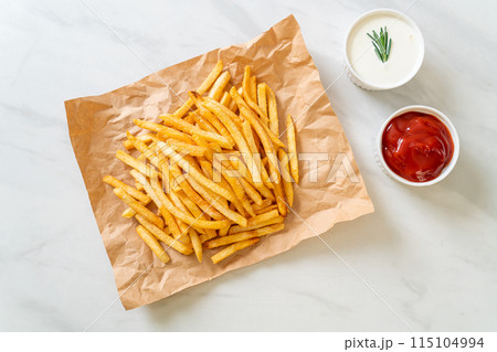 French fries with sour cream and ketchup French fries with sour cream and ketchup 115104994