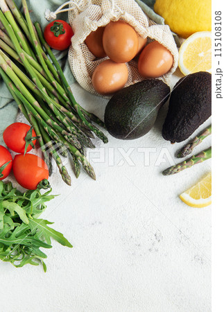 Fresh Vegetables and Eggs Arranged on a Light Surface for Healthy Cooking Fresh Vegetables and Eggs Arranged on a Light Surface for Healthy Cooking 115108108
