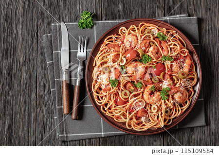 shrimp fra diavolo with spaghetti on a plate shrimp fra diavolo with spaghetti on a plate 115109584