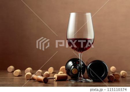Red wine and wine corks. Red wine and wine corks. 115110374
