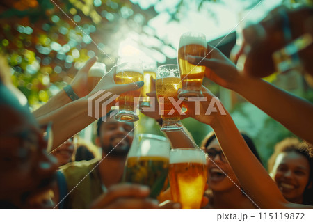 A group of happy friends raising glasses with beer at a party on vacation, concept for celebrating the end of a project or summer vacation, background or advertising idea for a vacation banner A group of happy friends raising glasses with beer at a party on vacation, concept for celebrating the end of a project or summer vacation, background or advertising idea for a vacation banner 115119872