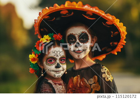 Portrait of a brother and sister dressed in a mesmerizing ensemble to attend a Day of the Dead festival or the traditional Mexican holiday Dia de los Muertos 115120172