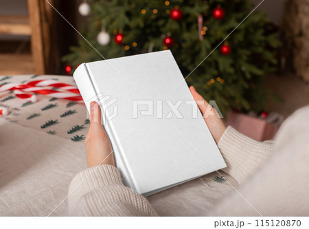Woman writing christmas wish list. Mockup background with hand, new year gift view. Winter write on Woman writing christmas wish list. Mockup background with hand, new year gift view. Winter write on 115120870