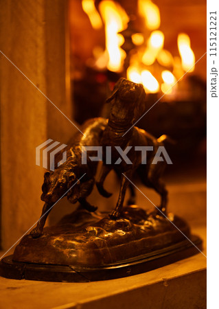 hunter dog statue beside fireplace hunter dog statue beside fireplace 115121221