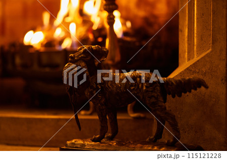 hunter dog statue beside fireplace hunter dog statue beside fireplace 115121228