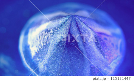 Sparkling diamond. Shimmer crystal. Glitter paint. Defocused blue purple color neon iridescent luminous gemstone shiny glossy liquid reflected rainbow light abstract art background. Sparkling diamond. Shimmer crystal. Glitter paint. Defocused blue purple color neon iridescent luminous gemstone shiny glossy liquid reflected rainbow light abstract art background. 115121447