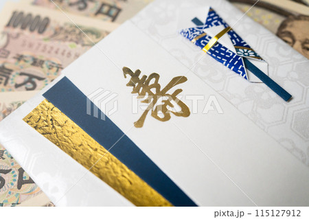 ご祝儀袋とお金 冠婚葬祭イメージ ご祝儀袋とお金 冠婚葬祭イメージ 115127912