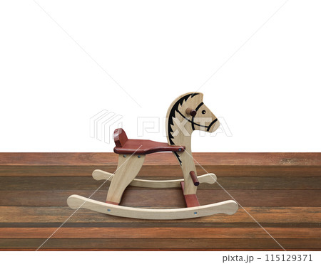Rocking horse on wooden floor Isolated on a white background Rocking horse on wooden floor Isolated on a white background 115129371