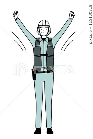 ラジオ体操をするヘルメットと作業着姿のシニア女性技師 ラジオ体操をするヘルメットと作業着姿のシニア女性技師 115130818