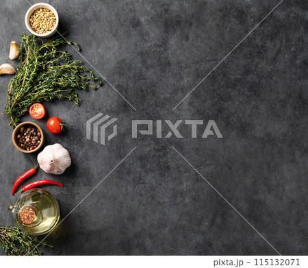 Seasonings, spices and fresh herbs thyme, coriander, garlic, pepper, tomatoes chili pepper Seasonings, spices and fresh herbs thyme, coriander, garlic, pepper, tomatoes chili pepper 115132071