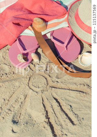 Shape of sun and different accessories for relax on sand 115137569