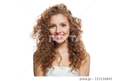 Lovely woman face. Young model with healthy skin, long hair and makeup on white background 115138845