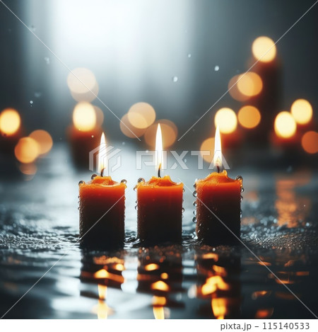 Three burning candles standing in the water. 115140533