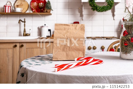 Bag of paper on table with food. Kitchen grocery shopping delivery vegetable. Home full healthy Bag of paper on table with food. Kitchen grocery shopping delivery vegetable. Home full healthy 115142253