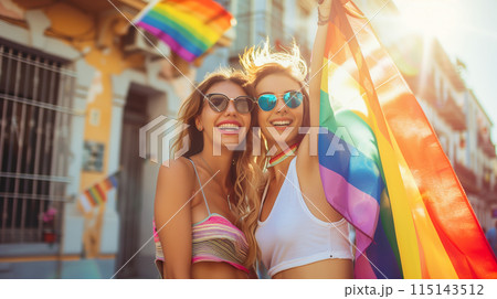 Lady holding rainbow color flag, symbol of LGBT pride month celebrate annual in June social of gay, lesbian, bisexual, transgender, human rights. 115143512