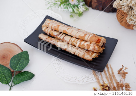 Tiramisu flavored banana rolls as a background Tiramisu flavored banana rolls as a background 115146116