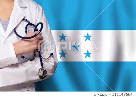 Honduran medicine and healthcare concept. Doctor close up against flag of Honduras background 115147664