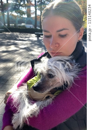young woman with a dog young woman with a dog 115148234