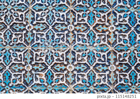 ancient wall of old mosque Hazrati Imam is decorated with ceramic tiles with traditional oriental Uzbek ornament Islamic pattern in Uzbekistan 115148251
