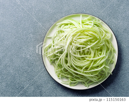 Zucchini noodles on plate. Top view, copy space Zucchini noodles on plate. Top view, copy space 115150163