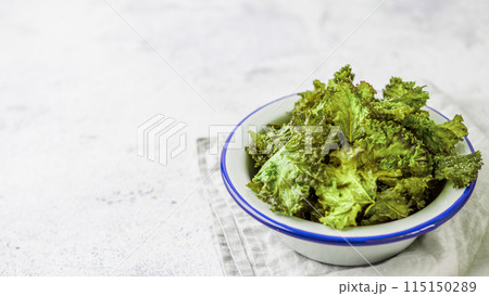 Homemade kale chips, copy space left Homemade kale chips, copy space left 115150289