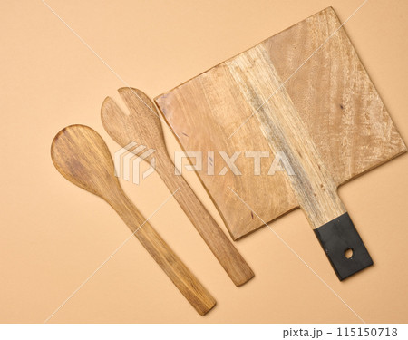 Empty wooden vintage fork and spoon with long handle Empty wooden vintage fork and spoon with long handle 115150718