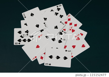 Playing cards on a dark background, games of chance 115152477