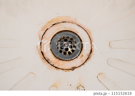 Dirty drain in the bathroom, cleaning service concept, old rusty shower drain 115152619