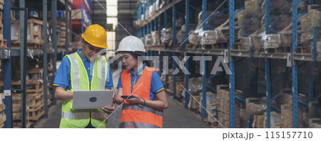 Banner Warehouse management team using laptop check stock inventory. Panorama asian worker use software computer type keyboard at goods shelf. Teamwork logistics staff counting stock with copy space 115157710