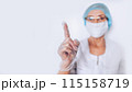 Elderly mature woman doctor or nurse raised finger in a white medical coat, gloves, face mask wearing personal protective equiment isolated. Healthcare and medicine concept. Covid-19 pandemic 115158719