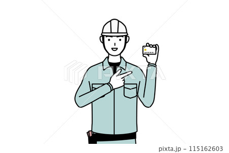 クレジット決済を勧めるヘルメットと作業着姿の男性 クレジット決済を勧めるヘルメットと作業着姿の男性 115162603