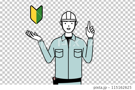 A man wearing a helmet and work clothes showing the greenery mark 115162625