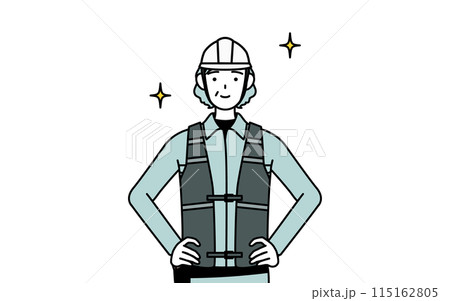 両手を腰に当てたヘルメットと作業着姿のシニア女性技師 115162805