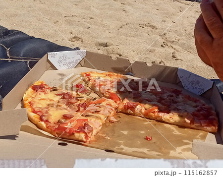Ready pizza. Pizza with ham. Ready pizza. Pizza with ham. 115162857