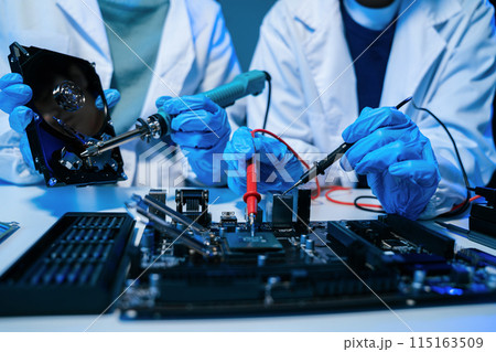 Repairing and upgrade mobile phone, electronic, computer hardware and technology concept. Repairing and upgrade mobile phone, electronic, computer hardware and technology concept. 115163509