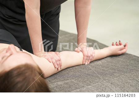 Thai massage treatment. Two woman at spa salon. Reflexology healthy therapy Thai massage treatment. Two woman at spa salon. Reflexology healthy therapy 115164203