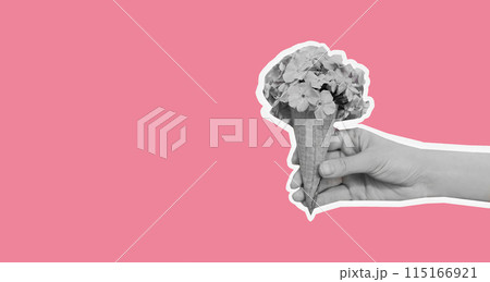 Hand holding cone ice cream with flowers on pink background, magazine style 115166921