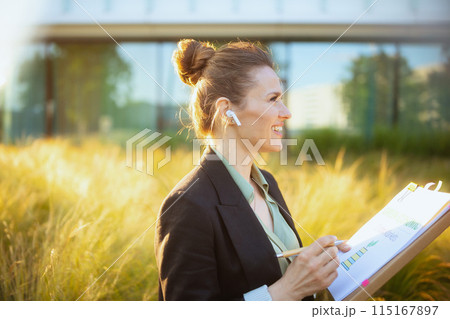 happy modern business woman near business center happy modern business woman near business center 115167897
